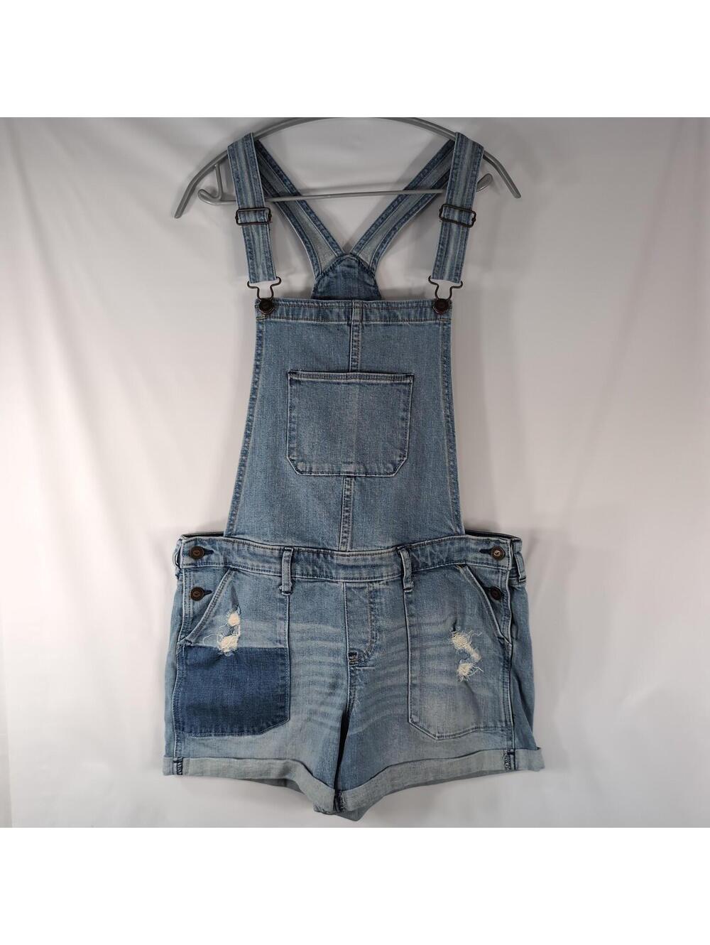 Hollister distressed denim boyfriend shortalls feature a light wash size M